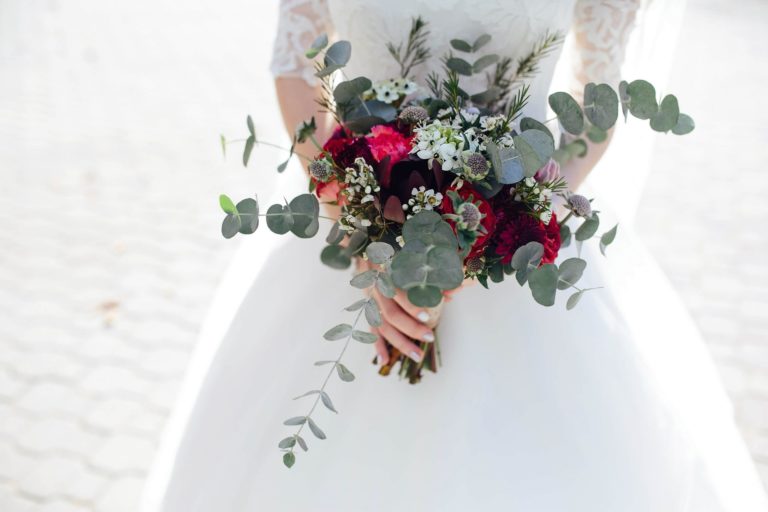 bride-holding-wedding-bouquet-PML4PZN-1-scaled.jpg